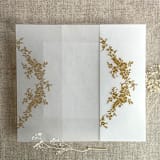"Gold print French floral crest vellum wrap for 5x7 card | pack of 10" - Invitation Jackets and Overlays in gold by Ivory Invitations