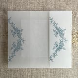 "Steel blue print French floral crest vellum wrap for 5x7 card | pack of 10" - Invitation Jackets and Overlays in blue by Ivory Invitations
