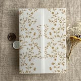 "Gold color dainty floral vines printed vellum wrap for 5x7 card | pack of 10" - Invitation Jackets and Overlays in gold by Ivory Invitations