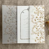 "Gold color dainty floral vines printed vellum wrap for 5x7 card | pack of 10" - Invitation Jackets and Overlays in gold by Ivory Invitations