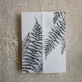 "Black fern leaves greenery printed vellum wrap for 5x7 card  | pack of 10" - Invitation Jackets and Overlays in black by Ivory Invitations
