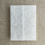 "White ink print Victorian botanical garden vellum wrap for 5x7 card | pack of 10" - Invitation Jackets and Overlays in white by Ivory Invitations