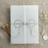 "Sage ribbon bow printed vellum wrap for 5x7 card | pack of 10" - Invitation Jackets and Overlays in green by Ivory Invitations