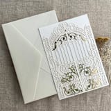 "Ivory Castle Gate Lasercut Jacket for 5x7 inch Invitation | Pack of 10 | Envelopes Included" - Invitation Jackets and Overlays in white by Ivory Invitations