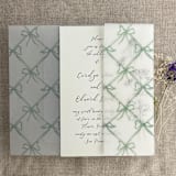 "Festive ribbon bow lattice sage printed vellum wrap for 5x7 card | pack of 10" - Invitation Jackets and Overlays in green by Ivory Invitations