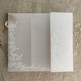 "White ink print Marianne's bouquet floral printed vellum wrap for 5x7 card  | pack of 10" - Invitation Jackets and Overlays in white by Ivory Invitations