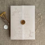 "White ink print Marianne's bouquet floral printed vellum wrap for 5x7 card  | pack of 10" - Invitation Jackets and Overlays in white by Ivory Invitations