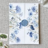 "Blue florals and butterflies vellum jacket | Set of 10" - Invitation Jackets and Overlays in blue by Maria Ferrer G.