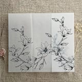 "Black Magnolia flowers printed vellum wrap for 5x7 card  | pack of 10" - Invitation Jackets and Overlays in black by Ivory Invitations