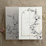 "Black Magnolia flowers printed vellum wrap for 5x7 card  | pack of 10" - Invitation Jackets and Overlays in black by Ivory Invitations