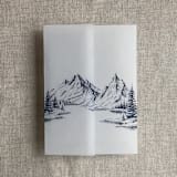 "Blue mountain sketch printed vellum wrap for 5x7 card | pack of 10" - Invitation Jackets and Overlays in blue by Ivory Invitations