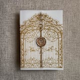 "Classic gold vintage style arched gate printed vellum wrap for 5x7 card | pack of 10" - Invitation Jackets and Overlays in gold by Ivory Invitations