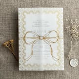 "Gold ribbon bow printed vellum wrap for 5x7 card | pack of 10" - Invitation Jackets and Overlays in gold by Ivory Invitations