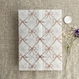 "Festive ribbon bow lattice rosy pink printed vellum wrap for 5x7 card | pack of 10" - Invitation Jackets and Overlays in pink by Ivory Invitations