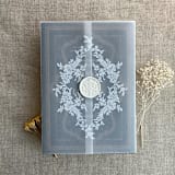 "White ink print french floral crest vellum wrap for 5x7 card | pack of 10" - Invitation Jackets and Overlays in white by Ivory Invitations