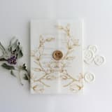"Golden Magnolia flowers printed vellum wrap for 5x7 card  | pack of 10" - Invitation Jackets and Overlays in gold by Ivory Invitations