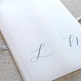 "Personalized Vellum Jacket with Initials (Set of 10)" - Invitation Jackets and Overlays in black by Caroline Russo