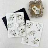 "White Neutral Wildflower Vellum Jacket for Wedding Invitations | Set of 10" - Invitation Jackets and Overlays in white by Eva Friesen