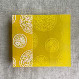 "White ink printed citrus celebration yellow vellum wraps for 5x7 card | pack of 10" - Invitation Jackets and Overlays in yellow by Ivory Invitations