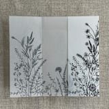 "Black English botanical garden floral printed vellum wrap for 5x7 card | pack of 10" - Invitation Jackets and Overlays in black by Ivory Invitations