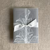 "White calla floral printed vellum wrap for 5x7 card | pack of 10" - Invitation Jackets and Overlays in white by Ivory Invitations