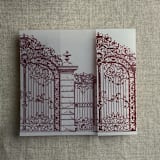 "Burgundy vintage arched gate printed vellum wrap for 5x7 card | pack of 10" - Invitation Jackets and Overlays in red by Ivory Invitations