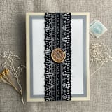 "Emma black lace printed vellum wrap for 5x7 card | pack of 10" - Invitation Jackets and Overlays in black by Ivory Invitations
