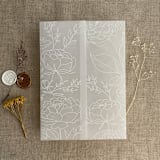 "White ink print minimalist boho peony greenery printed vellum wrap for 5x7 card | pack of 10" - Invitation Jackets and Overlays in white by Ivory Invitations