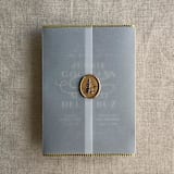 "Aurelia dot gold trim vellum wrap for 5x7 cards | pack of 10" - Invitation Jackets and Overlays in gold by Ivory Invitations