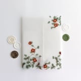 "Red velvet Camellia floral branch printed vellum wrap for 5x7 card  | pack of 10" - Invitation Jackets and Overlays in red by Ivory Invitations