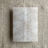 "Cashmere poppy floral toile printed vellum wrap for 5x7 card | pack of 10" - Invitation Jackets and Overlays in beige by Ivory Invitations