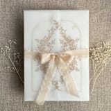 "Cashmere print French floral crest vellum wrap for 5x7 card | pack of 10" - Invitation Jackets and Overlays in beige by Ivory Invitations