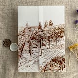 "Brown vineyard landscape sketch printed vellum wrap for 5x7 card | pack of 10" - Invitation Jackets and Overlays in brown by Ivory Invitations