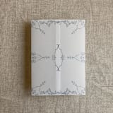 "Grace floral steel blue vellum wrap for 5x7 card | pack of 10" - Invitation Jackets and Overlays in blue by Ivory Invitations