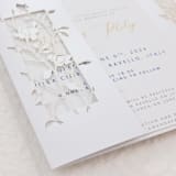 "White Metallic Laser Cut Covers with Roses for 5x7 Card | Set of 10 | Envelopes Included" - Invitation Jackets and Overlays in white by Self Stationery