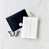 "Vintage Floral White Vellum Wrap | Set of 10" - Invitation Jackets and Overlays in white by Eva Friesen