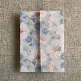 "Seao floral vellum wrap for 5x7 card | pack of 10" - Invitation Jackets and Overlays in multicolor by Ivory Invitations