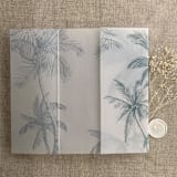 "Palm trees beach side steel blue printed vellum wrap for 5x7 card | pack of 10" - Invitation Jackets and Overlays in blue by Ivory Invitations