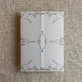 "Grace floral mocha vellum wrap for 5x7 card | pack of 10" - Invitation Jackets and Overlays in brown by Ivory Invitations