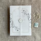 "Jessica black minimalist flowers printed vellum wrap for 5x7 card | pack of 10" - Invitation Jackets and Overlays in black by Ivory Invitations