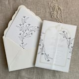 "Jessica black minimalist flowers printed vellum wrap for 5x7 card | pack of 10" - Invitation Jackets and Overlays in black by Ivory Invitations