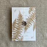 "Golden fern leaves greenery printed vellum wrap for 5x7 card  | pack of 10" - Invitation Jackets and Overlays in gold by Ivory Invitations