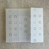 "Green horseshoes vellum wrap for 5x7 card | pack of 10" - Invitation Jackets and Overlays in green by Ivory Invitations