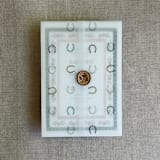 "Green horseshoes vellum wrap for 5x7 card | pack of 10" - Invitation Jackets and Overlays in green by Ivory Invitations