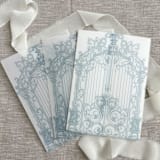 "Dusty blue ornamental gate vellum jacket for invitations | Set of 10" - Invitation Jackets and Overlays in blue by Orchid Studio