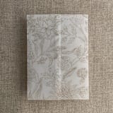 "Maeve botany reindeer printed vellum wrap for 5x7 card | pack of 10" - Invitation Jackets and Overlays in gold by Ivory Invitations