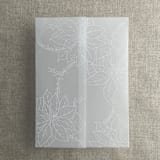 "White poinsettia vellum wrap for 5x7 card | pack of 10" - Invitation Jackets and Overlays in white by Ivory Invitations