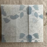 "Antique Hydrangea flower steel blue leaf printed vellum wrap for 5x7 card | pack of 10" - Invitation Jackets and Overlays in blue by Ivory Invitations