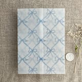 "Festive ribbon bow lattice sky blue printed vellum wrap for 5x7 card | pack of 10" - Invitation Jackets and Overlays in blue by Ivory Invitations