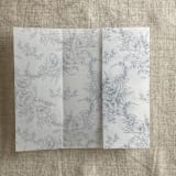 "Steel blue poppy floral toile printed vellum wrap for 5x7 card | pack of 10" - Invitation Jackets and Overlays in blue by Ivory Invitations